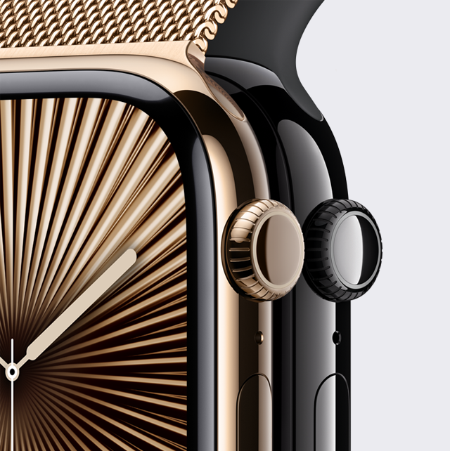 Close dos acabamentos titânio dourado e alumínio preto brilhante.